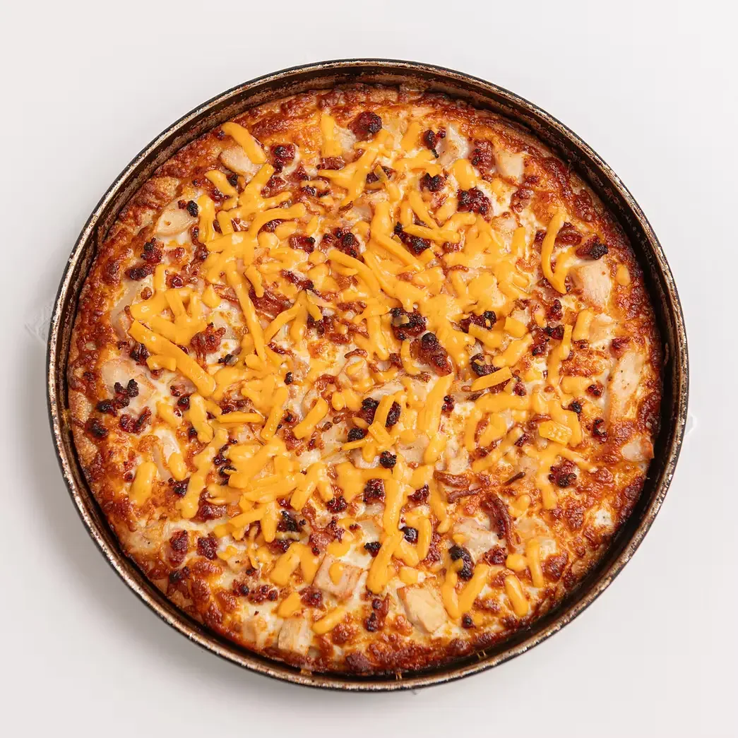 Chicken Tikka Pizza at The Kolachi Kitchen Downtown Winnipeg — best fusion pizza Winnipeg