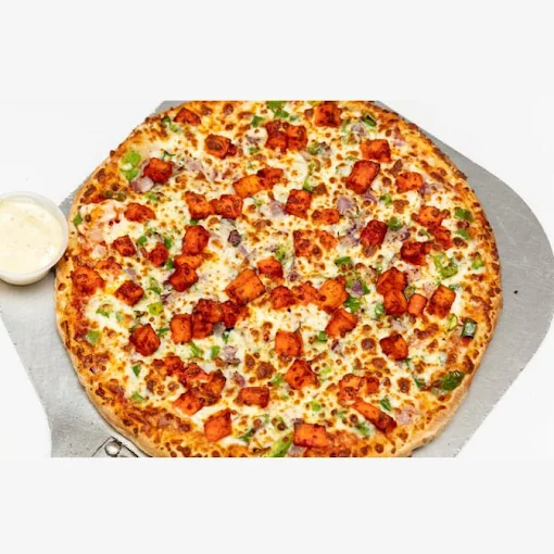 The Kolachi Kitchen chicken tikka pizza Winnipeg — halal fusion pizza